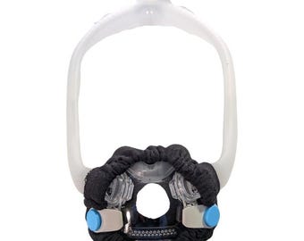 May include: A CPAP full face mask with a clear plastic frame and a black fabric cushion. The mask has a clear plastic nasal piece and blue adjustment clips. The mask is designed to cover the nose and mouth.