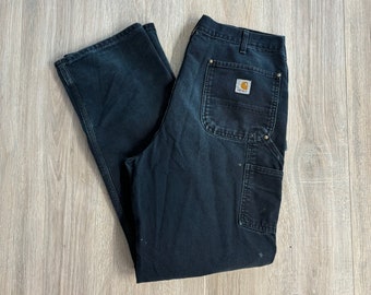 Pantalon de travail Carhartt noir délavé à double genou (taille 36)