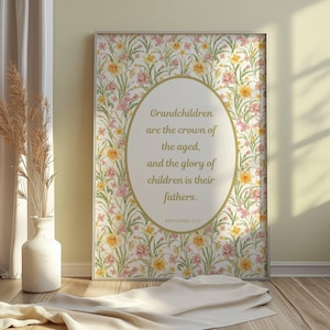 May include: A framed print with a floral background and a quote about grandchildren being the crown of the aged. The quote is from Proverbs 17:6.