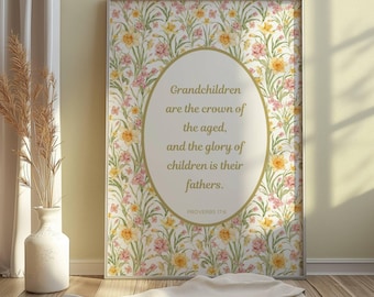 Pode incluir: Uma impressão emoldurada com fundo floral e uma citação sobre netos serem a coroa dos idosos. A citação é de Provérbios 17:6.