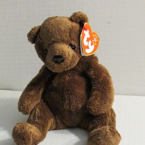Ty Beanie Baby “Hero” Firefighter Bear Birthday June 18, 2000 Hang Tag in Ty Heart Protector & Tush Tag New Condition