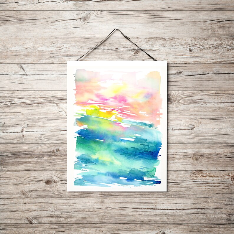 K&ouml;nnte beinhalten: Abstrakte Aquarellmalerei mit einem farbigen Verlauf von Rosa, Gelb, Gr&uuml;n und Blau. Das Gem&auml;lde hat einen strukturierten Pinselstrich-Effekt.