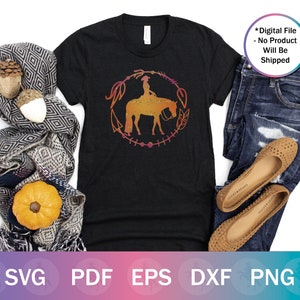 May include: A black t-shirt with a colorful graphic of a woman riding a horse. The graphic is surrounded by a wreath of leaves and flowers. The text "*Digital File - No Product Will Be Shipped" is in the top right corner of the image.