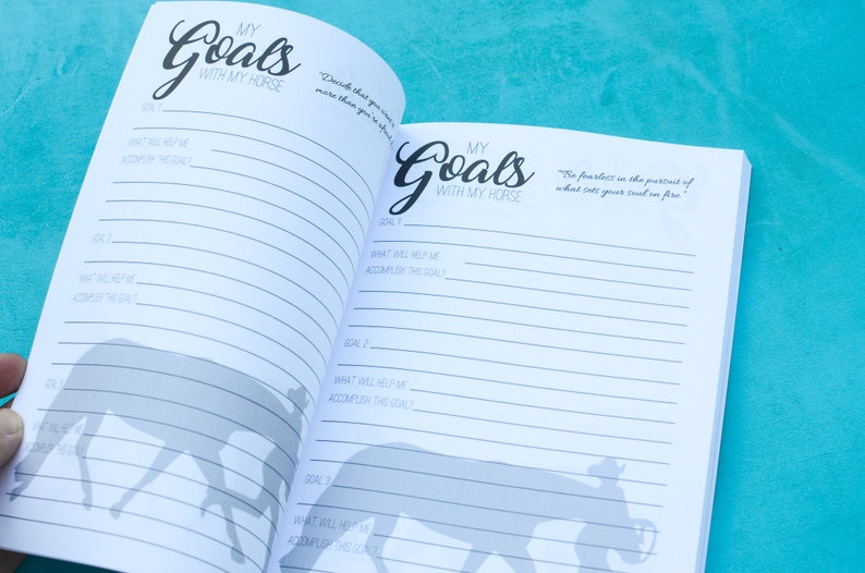 May include: An open notebook with lined pages and the title "My Goals with My Horse" on the cover. The notebook has a silhouette of a horse and rider on each page.