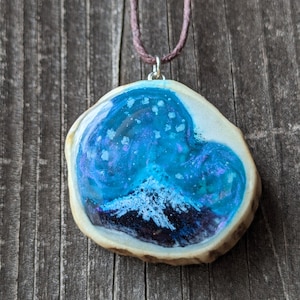 Antler painted mountain scene in resin with glow in the dark stars