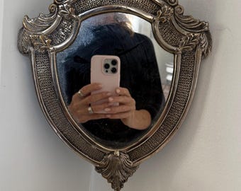 Aplique de pared vintage de metal plateado con espejo y portavelas