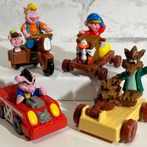 McDonald's Piggsburg Pigs Happy Meal Toys Juego completo 1991 Figura de plástico Cómic de dibujos animados Comedia animada Cake Topper Hermanos lobo Huff Puff