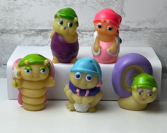 Figuras vintage de Hasbro Playskool Glo Friends de los años 80. Elige tu insecto favorito de la serie de dibujos animados de televisión: mariposa, araña, zorrillo. Brilla en la oscuridad.