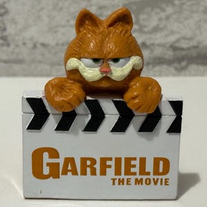Garfield THE MOVIE Plastic PVC figure Fat Cat Sealed Rare Garfield with Classic Director’s Clapboard Kitten Cartoon Comic Jim Davis Smug