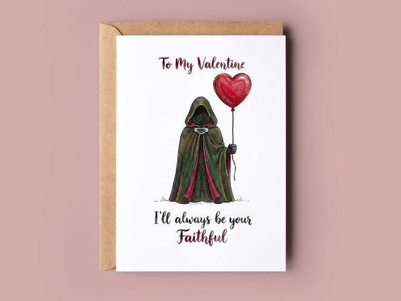 May include: Valentine's Day card featuring a cloaked figure holding a red heart-shaped balloon. The card reads "To My Valentine, I'll always be your Faithful" in elegant script. The illustration is set against a white background.