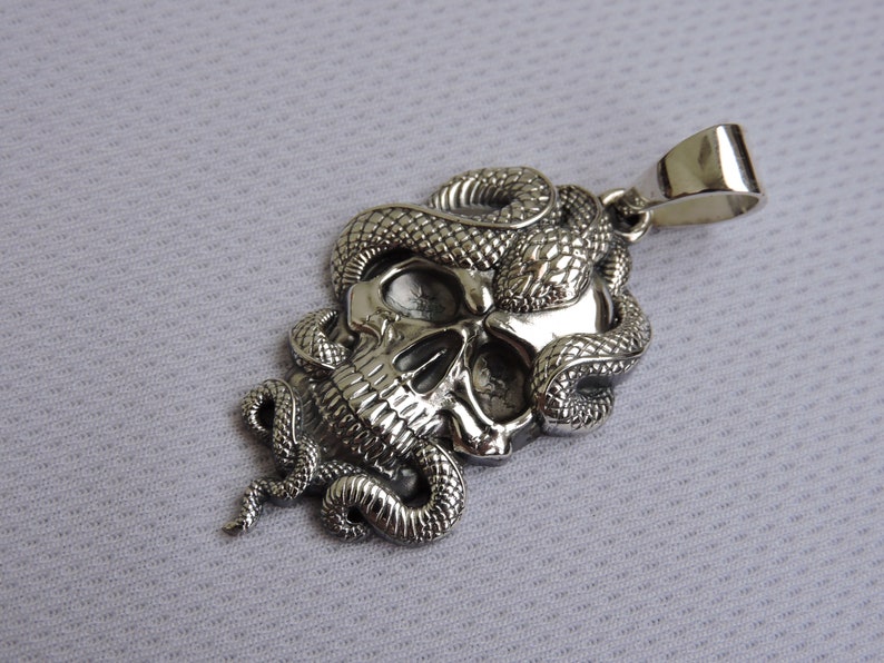 Snake skull pendant