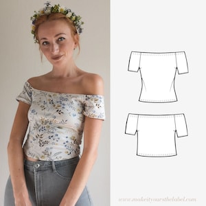 Peut inclure: Un haut blanc à épaules dénudées avec un imprimé floral et des manches courtes. Un dessin au trait du haut est présenté à côté de la photo.