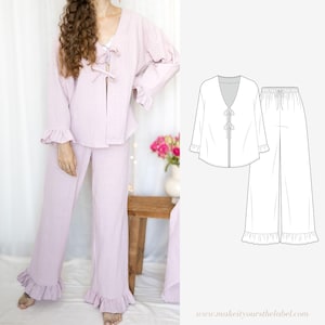 May include: A light pink pyjama set with a ruffled trim. The top has a V-neck and a tie at the front. The trousers are wide-legged and have a drawstring waist.