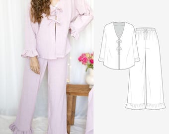 May include: A light pink pajama set with a ruffled trim. The top has a V-neck and a tie at the front. The pants are wide-legged and have a drawstring waist.