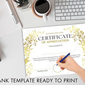 May include: A blank certificate of appreciation template with a gold floral design. The text "COMPANY NAME HERE" and "CERTIFICATE OF APPRECIATION" is at the top of the template. The text "THIS IS AWARDED TO" is below the title. The text "THANK YOU FOR YOUR TIRELESS EFFORTS, YOUR DEDICATION TO OUR MISSION. YOU ARE TRULY AP" and "NG SUPPORT, AND COMMITMENT" is at the bottom of the template. The text "INSTRUCTOR" is in a circle at the bottom left of the template.