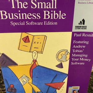 May include: The Small Business Bible book cover. The cover is purple with white text and features an illustration of a person with a question mark head. The book is a special software edition and features Andrew Tobias' Managing Your Money Software.