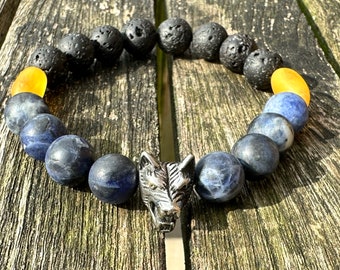 Men's natural stone bracelet in sodalite and lava stone with wolf head charm