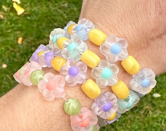 Fancy children's bracelet with natural stones and plastic flower beads