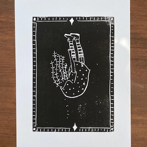 Linocut print. flower girl