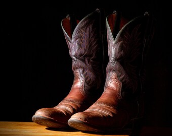 Fotoafdruk cowboylaarzen: rustieke westerse muurkunst