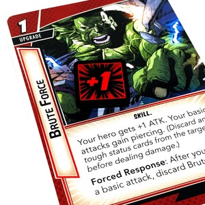 May include: A green and red card with the text "BRUTE FORCE" and "SKILL." The card features a green character with a red +1 symbol. The text reads: "Your hero gets +1 ATK. Your basic attacks gain piercing. (Discard any tough status cards from the target before dealing damage.) Forced Response: After you make a basic attack, discard Brute Force."