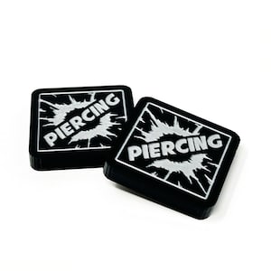 2 x Piercing Tokens (doppelseitig) für Marvel Logos L.C.G