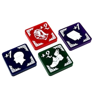 May include: Four square game tokens with different symbols and colours. A red token with a fist and +2, a purple token with a book and +1, a blue token with a head and +1, and a green token with a winged shoe and +2.