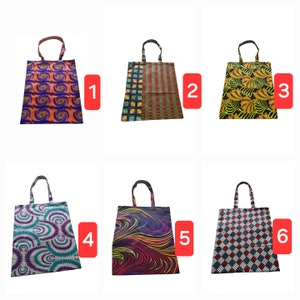 May include: Six different tote bags with various colorful patterns. The bags are made of canvas and have a simple design. The patterns include geometric shapes, swirls, and floral designs.