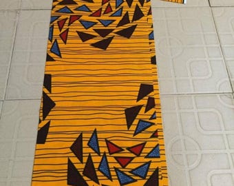 Tela estampada africana Ankara amarilla: Algodón vibrante para confección de vestidos, se vende cortada a medida.