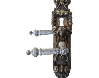 Art Deco Door Knob and Bronze Back Plate depicting a Woman Face
