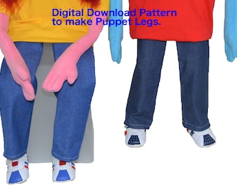 May include: A digital download pattern for making puppet legs. The pattern includes instructions for making two pairs of blue jeans legs with red and white trainers.