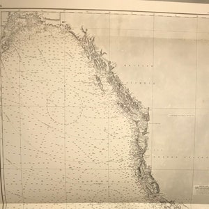 May include: A vintage nautical chart of the Pacific Ocean, showing the coastline of North America from Cape Corrientes, Mexico to Kodiak Island. The chart is printed on a cream-colored paper and includes detailed markings and lines.