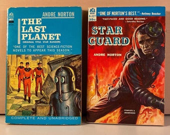 May include: Two vintage paperback science fiction books by Andre Norton. The Last Planet, original title Star Rangers, features a cover with a group of men in red uniforms and a robot. Star Guard features a cover with a man in a red and black spacesuit standing in front of a fiery background.