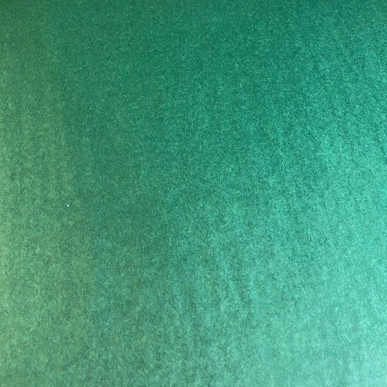 Puede incluir: Una superficie texturizada verde s&oacute;lido con un ligero degradado de verde claro a verde oscuro.