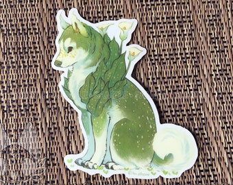 May include: A green and white sticker featuring a cartoon dog with white flowers growing from its back. The dog is sitting with its head turned to the side. The sticker has a white border and a copyright notice at the bottom.