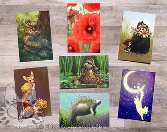 May include: Set of 10 illustrated cards featuring various animals and nature scenes. The cards include a snake on a tree, a duck in a pond, a manatee in the water, a cat in the night sky, a chicken with flowers, and a squirrel on a rock.