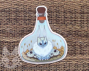 Pegatina de vinilo transparente con forma de botella de gatito y polilla