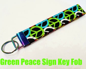 Correas para llavero con el signo de la paz (verde, naranja, rosa y amarillo)