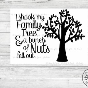 May include: Black and white silhouette of a family tree with the text "I shook my family tree & a bunch of nuts fell out".