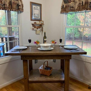 Solid real hardwood kitchen island/table.
