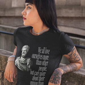 We All Love ourselves more than other people, but care about their opinions more than our own. Marcus Aurelius Unisex Ultra Cotton Tee