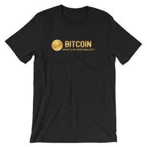 Bitcoin ist, was in deinem Portemonnaie Kurzarm Unisex T-Shirt