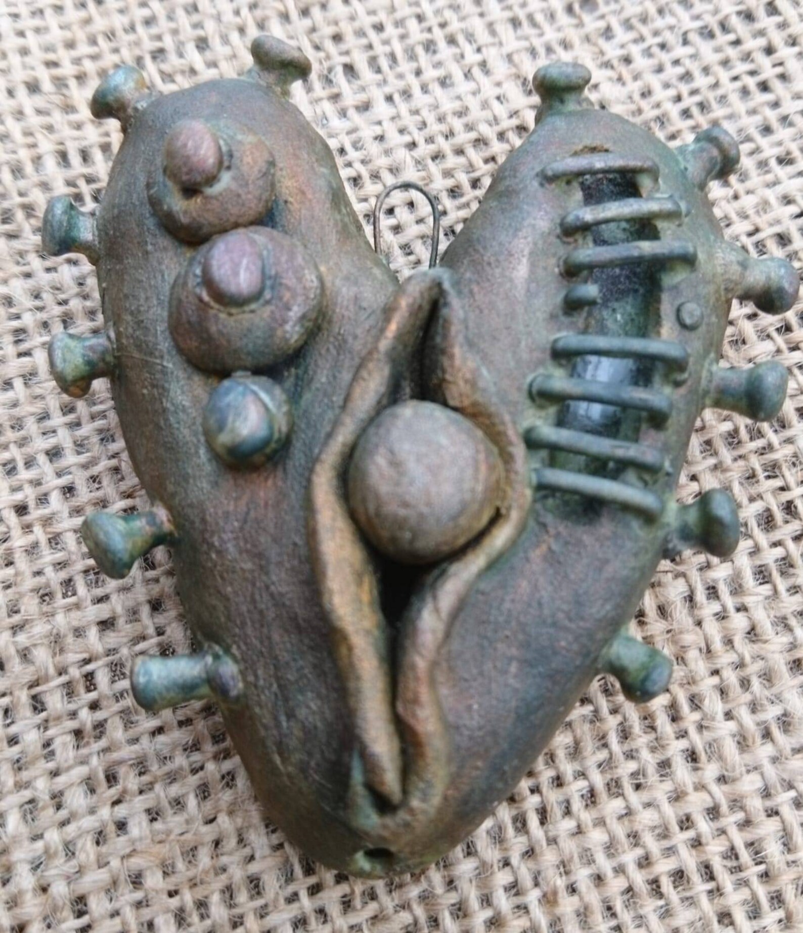 Artisan vulva art. Heart shaped ceramic vulva art pendant. Etsy