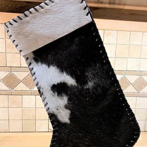 Showman ® Black and White Speckled Cowhide Christmas Stocking