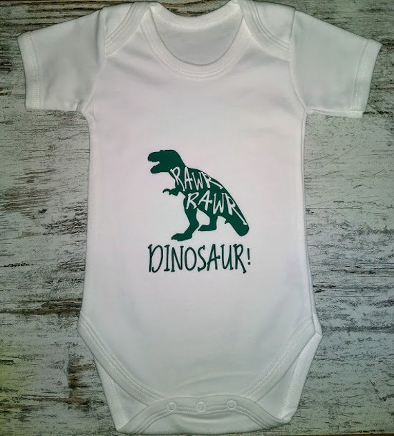 pink dinosaur baby grow