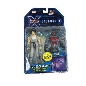 May include: A packaged action figure set featuring two figures from the Marvel X-Men: Evolution series. The packaging includes the text "Ninja Wolverine with Martial Arts Training Dummy" and "Triple X-treme Action!"