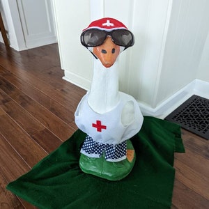 Goose clothing, Lifeguard Goose size Large.  Shorts 2 Color Options. Goose Outfit, Geese Outfits, Lawn Goose, Yard Goose, cement goose.