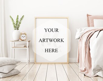 A3 Bedroom frame mockup, portrait frame mock-up, leaning floor frame bedroom, gold frame, contemporary interior, natural lighting.