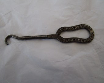 Antique Advertising Premium Shoe Buton Hook " Cannon's Shoes "
