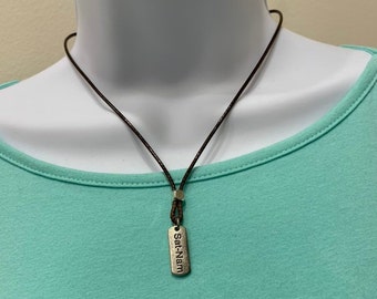 Sat Nam Tag Necklace: Antique Silver Charm, Waxed Cotton Cord